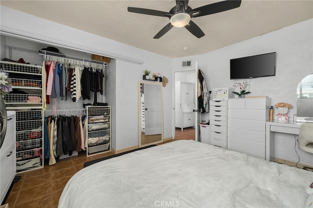 510 Archibald Ct, Colton, CA 92324 - bedroom with a closet, ceiling fan, tile patterned flooring, a desk, and baseboards