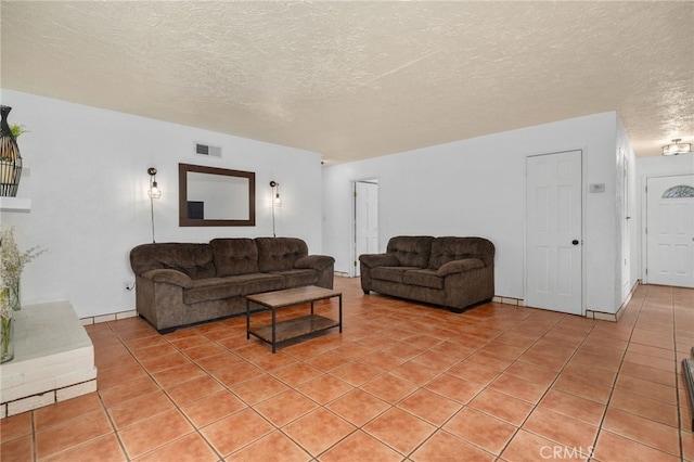 510 Archibald Ct, Colton, CA 92324 - living room with a textured ceiling and light tile patterned flooring