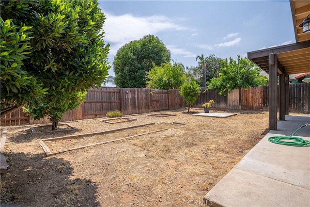 25717 Leah Ln, Menifee, CA 92586 - fenced backyard with a garden