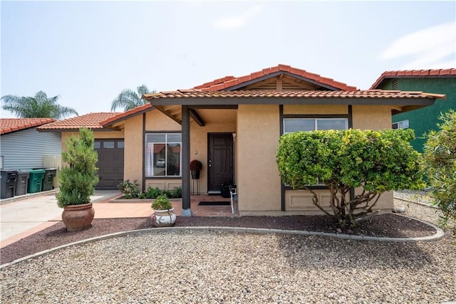 25717 Leah Ln, Menifee, CA 92586 - view of front of property with stucco siding, driveway, an attached garage, and a tile roof