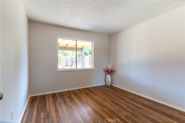 25717 Leah Ln, Menifee, CA 92586 - unfurnished room featuring wood finished floors, baseboards, and a textured ceiling