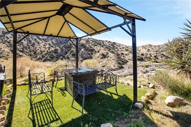 49490 Big Morongo Canyon Rd, Morongo Valley, CA 92256 - view of grassy yard with a gazebo and a mountain view