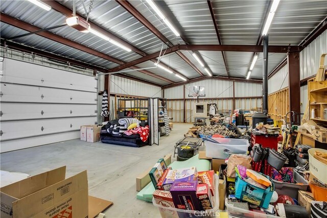 49490 Big Morongo Canyon Rd, Morongo Valley, CA 92256 - garage with metal wall and a garage door opener