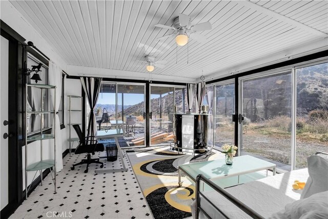 49490 Big Morongo Canyon Rd, Morongo Valley, CA 92256 - sunroom featuring wooden ceiling, a mountain view, and tile patterned floors