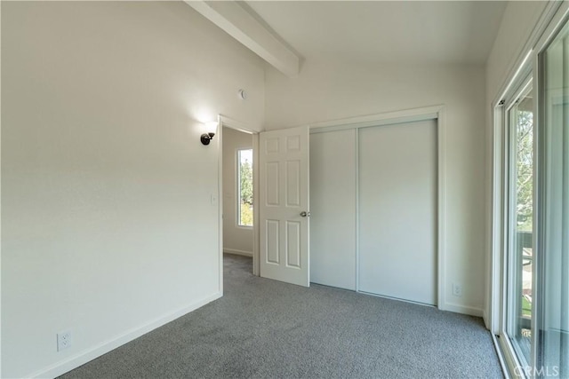 2100 1st Ln, Big Bear City, CA 92314 - unfurnished bedroom with multiple windows, carpet flooring, baseboards, and a closet