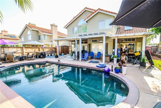 7223 Yarnell Rd, Highland, CA 92346 - view of swimming pool featuring a pergola, a patio, and a fenced backyard