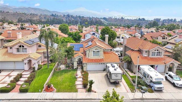 7223 Yarnell Rd, Highland, CA 92346 - aerial perspective of suburban area with mountains