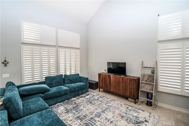7223 Yarnell Rd, Highland, CA 92346 - living room with baseboards and high vaulted ceiling