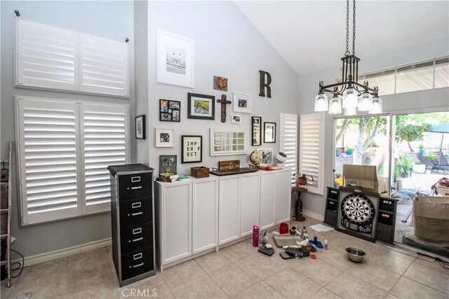 7223 Yarnell Rd, Highland, CA 92346 - dining room with high vaulted ceiling, baseboards, a chandelier, and light tile patterned flooring