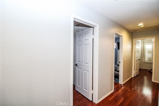 7223 Yarnell Rd, Highland, CA 92346 - corridor with attic access, dark wood-style floors, baseboards, and recessed lighting
