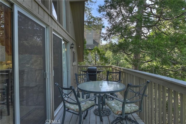 1192 Evergreen Ln, Lake Arrowhead, CA 92352 - view of wooden balcony with a wooden deck, outdoor dining space, and area for grilling