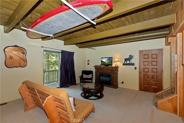 1192 Evergreen Ln, Lake Arrowhead, CA 92352 - living room featuring wooden ceiling with exposed beams, a glass covered fireplace, and stairway