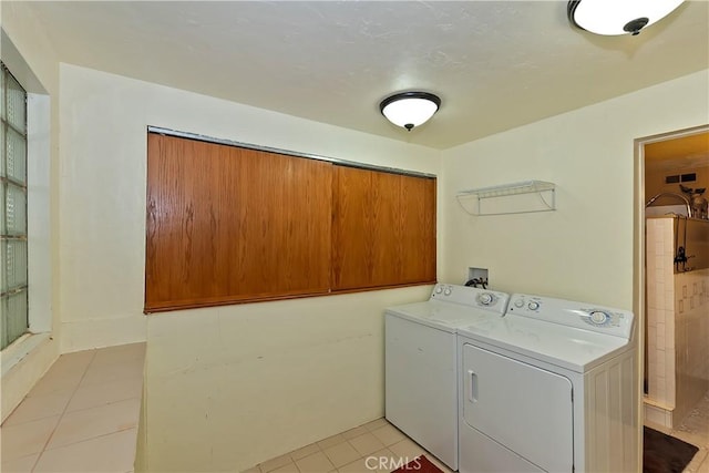 1192 Evergreen Ln, Lake Arrowhead, CA 92352 - laundry area featuring washer and clothes dryer and light tile patterned flooring