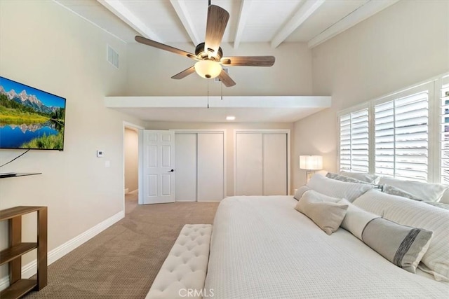 3021 E Hartford Rd, Orange, CA 92869 - carpeted bedroom with high vaulted ceiling, beamed ceiling, two closets, and ceiling fan