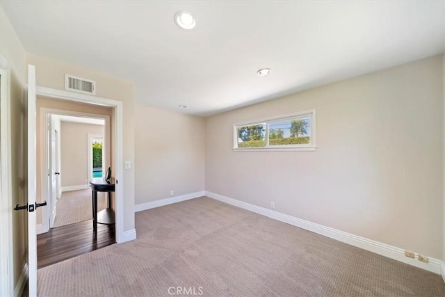 3021 E Hartford Rd, Orange, CA 92869 - unfurnished room featuring carpet, healthy amount of natural light, and recessed lighting