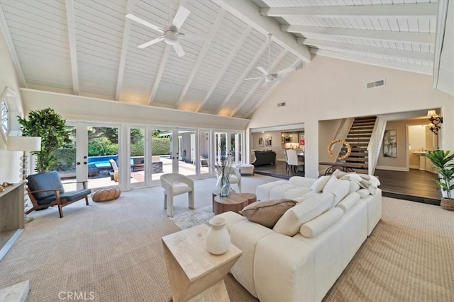 3021 E Hartford Rd, Orange, CA 92869 - carpeted living room featuring high vaulted ceiling, ceiling fan, beam ceiling, stairway, and french doors