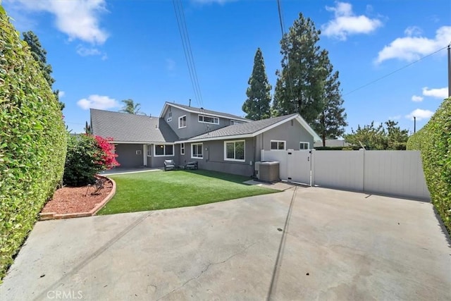 3021 E Hartford Rd, Orange, CA 92869 - back of property featuring a gate, a patio area, and stucco siding