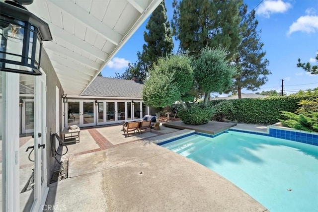 3021 E Hartford Rd, Orange, CA 92869 - view of swimming pool featuring french doors, a patio, and a fenced backyard