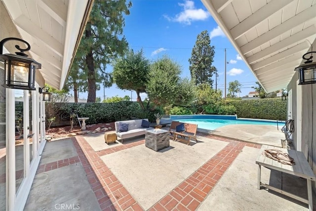 3021 E Hartford Rd, Orange, CA 92869 - fenced backyard featuring a patio and an outdoor fire pit