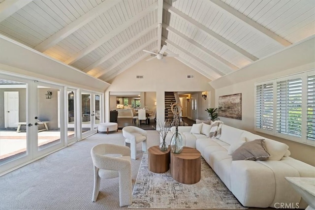 3021 E Hartford Rd, Orange, CA 92869 - living area with high vaulted ceiling, french doors, beamed ceiling, ceiling fan, and carpet floors