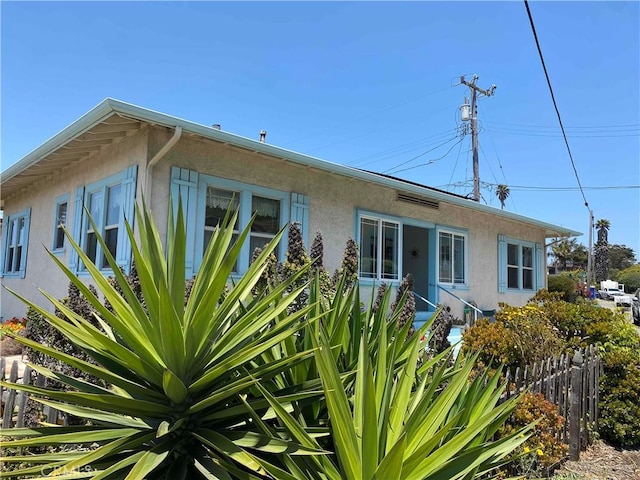 201 Old Creek Rd, Cayucos, CA 93430 - view of side of property featuring stucco siding
