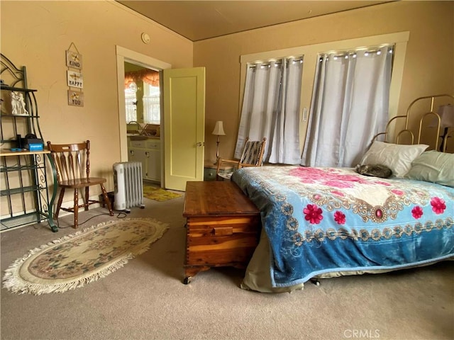 201 Old Creek Rd, Cayucos, CA 93430 - bedroom with radiator heating unit, carpet flooring, and a sink