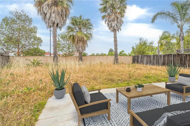 1065 Vaquero Cir, Oxnard, CA 93030 - fenced backyard with a patio area and outdoor lounge area