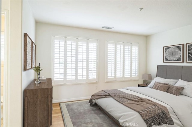 1065 Vaquero Cir, Oxnard, CA 93030 - bedroom with wood finished floors and baseboards