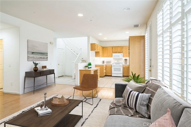 1065 Vaquero Cir, Oxnard, CA 93030 - living area featuring light wood-type flooring, stairs, and recessed lighting