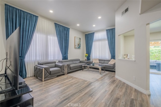 2052 Chenault Pl, Simi Valley, CA 93065 - living area with wood finished floors, recessed lighting, and baseboards