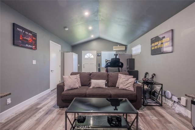 2052 Chenault Pl, Simi Valley, CA 93065 - living room featuring vaulted ceiling, wood finished floors, baseboards, a desk, and an AC wall unit