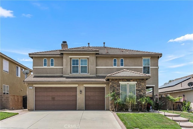 25079 Loring Rd, Wildomar, CA 92595 - mediterranean / spanish home with stucco siding, a garage, a tile roof, and concrete driveway