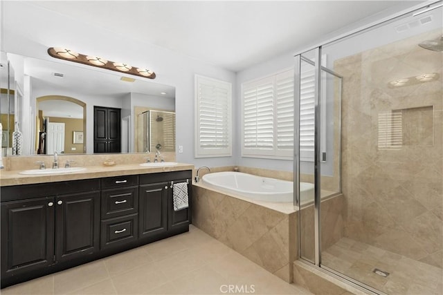 25079 Loring Rd, Wildomar, CA 92595 - bathroom featuring a stall shower, tile patterned floors, a bath, and double vanity