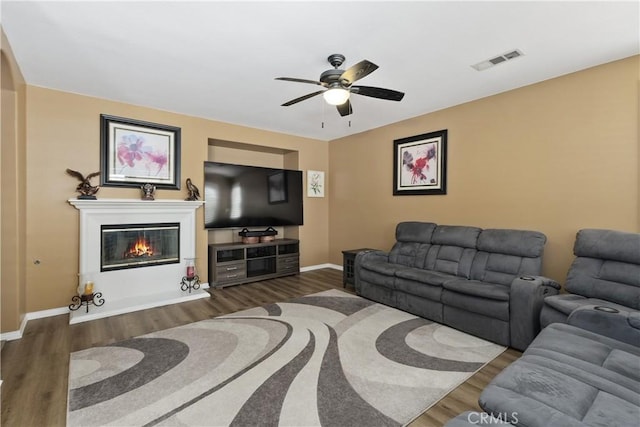 25079 Loring Rd, Wildomar, CA 92595 - living room featuring wood finished floors, a ceiling fan, and baseboards