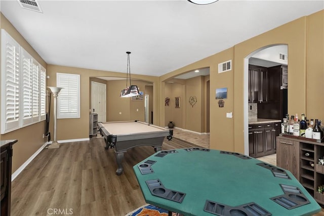 25079 Loring Rd, Wildomar, CA 92595 - recreation room with arched walkways, light wood-style floors, billiards table, and baseboards