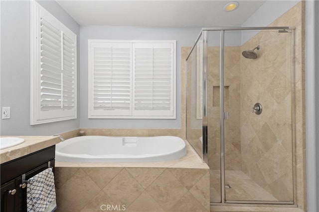 25079 Loring Rd, Wildomar, CA 92595 - full bathroom featuring a garden tub, a stall shower, and vanity