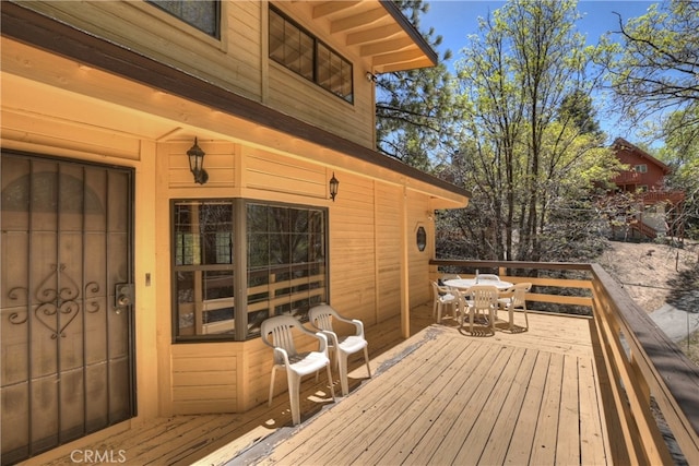 33294 Wild Rose Dr, Green Valley Lake, CA 92341 - wooden terrace with outdoor dining area