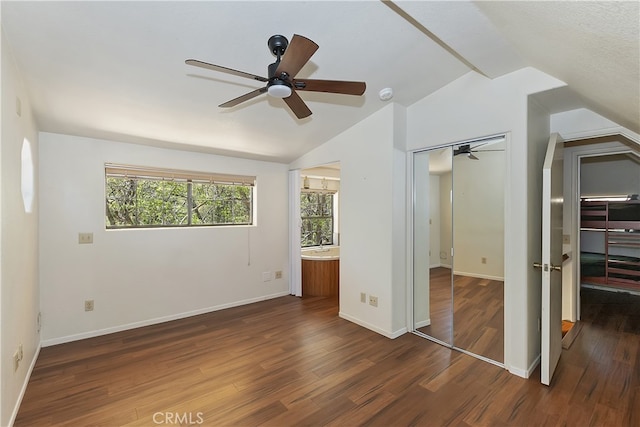 33294 Wild Rose Dr, Green Valley Lake, CA 92341 - unfurnished bedroom featuring lofted ceiling, wood finished floors, connected bathroom, baseboards, and a ceiling fan