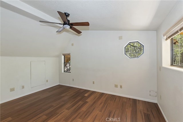 33294 Wild Rose Dr, Green Valley Lake, CA 92341 - spare room featuring wood finished floors, a ceiling fan, baseboards, and lofted ceiling