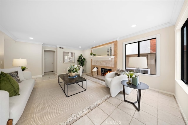 20 Chenile, Irvine, CA 92614 - living area featuring a warm lit fireplace, recessed lighting, baseboards, crown molding, and light tile patterned flooring