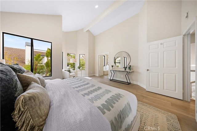 20 Chenile, Irvine, CA 92614 - bedroom featuring high vaulted ceiling, light wood finished floors, beamed ceiling, and baseboards