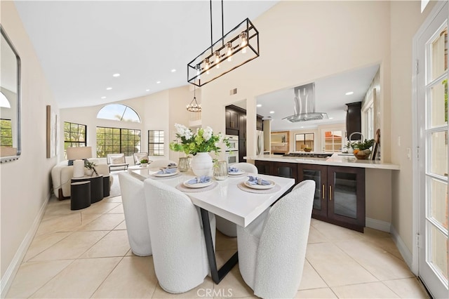 20 Chenile, Irvine, CA 92614 - dining area with recessed lighting, baseboards, light tile patterned floors, a towering ceiling, and a chandelier