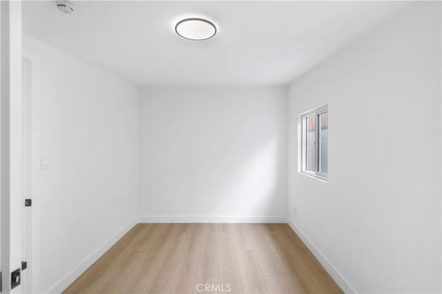 2218 S Meridian Ave, Alhambra, CA 91803 - spare room with light wood-type flooring, a smoke detector, and baseboards