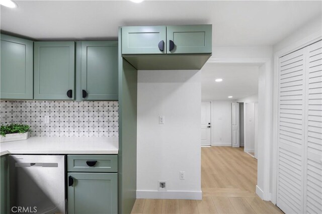 2218 S Meridian Ave, Alhambra, CA 91803 - kitchen with green cabinetry, stainless steel dishwasher, decorative backsplash, light countertops, and recessed lighting