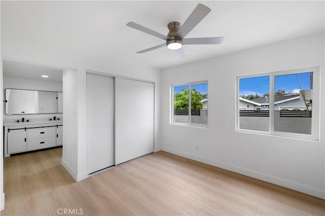 2218 S Meridian Ave, Alhambra, CA 91803 - unfurnished bedroom featuring baseboards, a closet, light wood-style floors, a ceiling fan, and recessed lighting