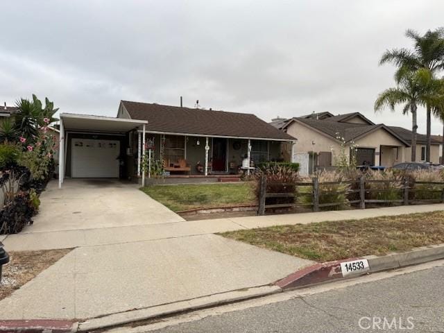 14533 Cameo Ave, Norwalk, CA 90650 - single story home with a porch, driveway, a carport, and a garage