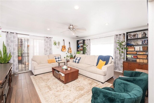 14121 Calais St, Baldwin Park, CA 91706 - living area featuring ornamental molding, wood finished floors, and a ceiling fan