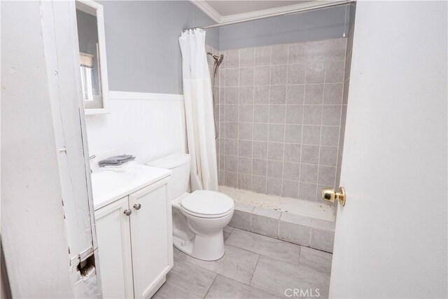 14121 Calais St, Baldwin Park, CA 91706 - full bathroom with toilet, vanity, tiled shower, ornamental molding, and tile patterned flooring