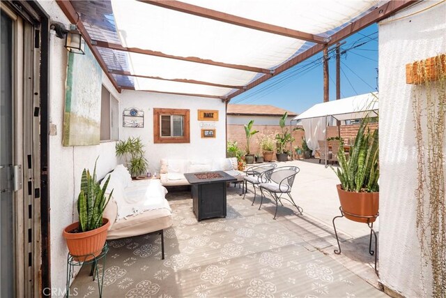 14121 Calais St, Baldwin Park, CA 91706 - fenced backyard featuring an outdoor fire pit, a pergola, and a patio
