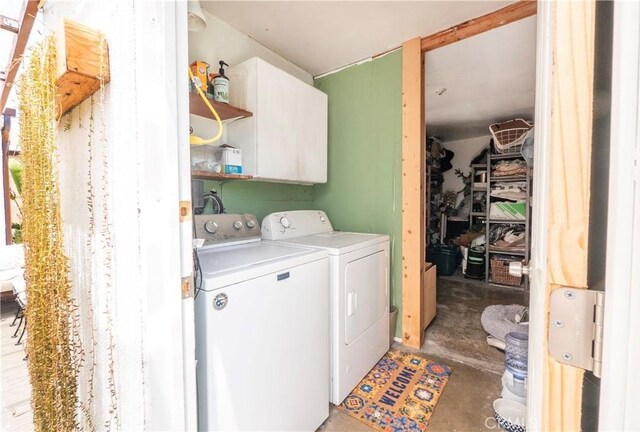 14121 Calais St, Baldwin Park, CA 91706 - laundry area featuring washer and clothes dryer and cabinet space